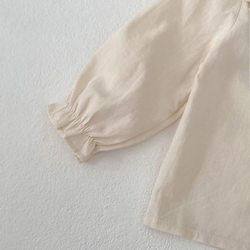 Black Ear Edge Doll Neck Top